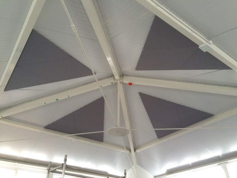 Acoustic ceiling panels installed in bespoke size to help with echo